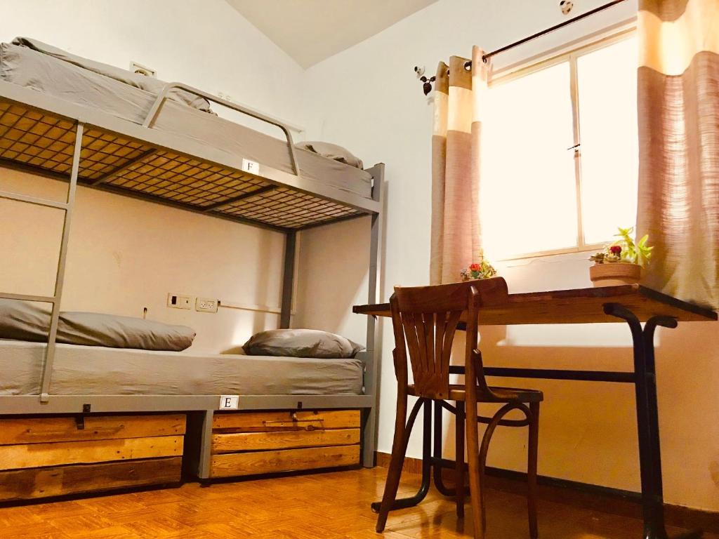 Voodi või voodid majutusasutuse Al Yakhour Hostel toas