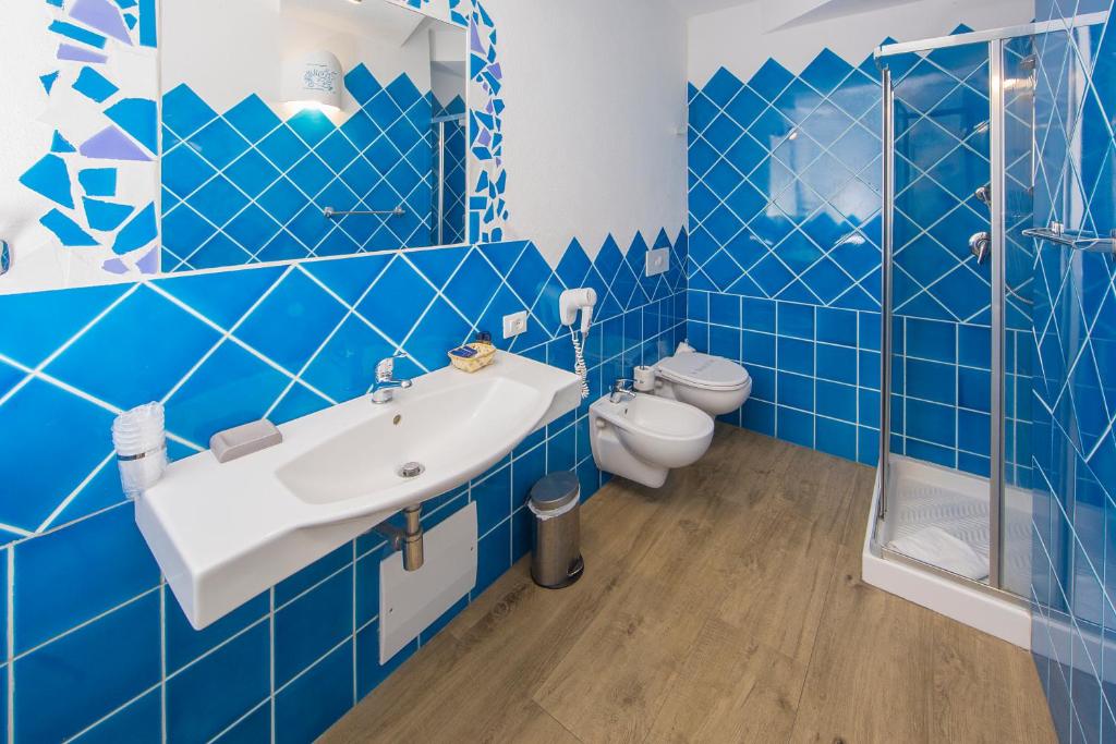 Koupelna v ubytování Olbia City Hotel