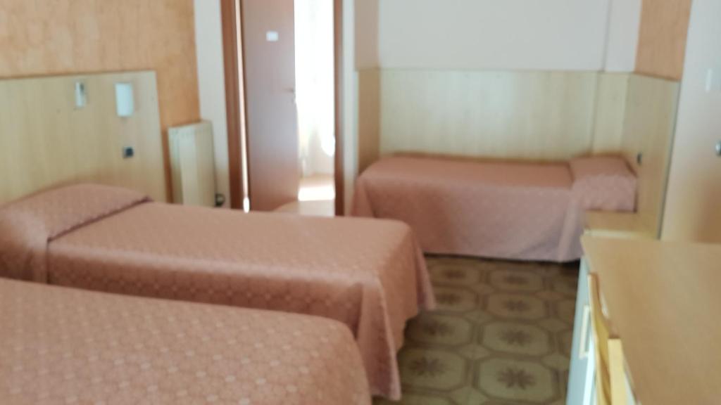 Postel nebo postele na pokoji v ubytování La Collina