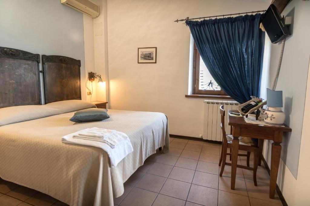 Postel nebo postele na pokoji v ubytování La Piaggia