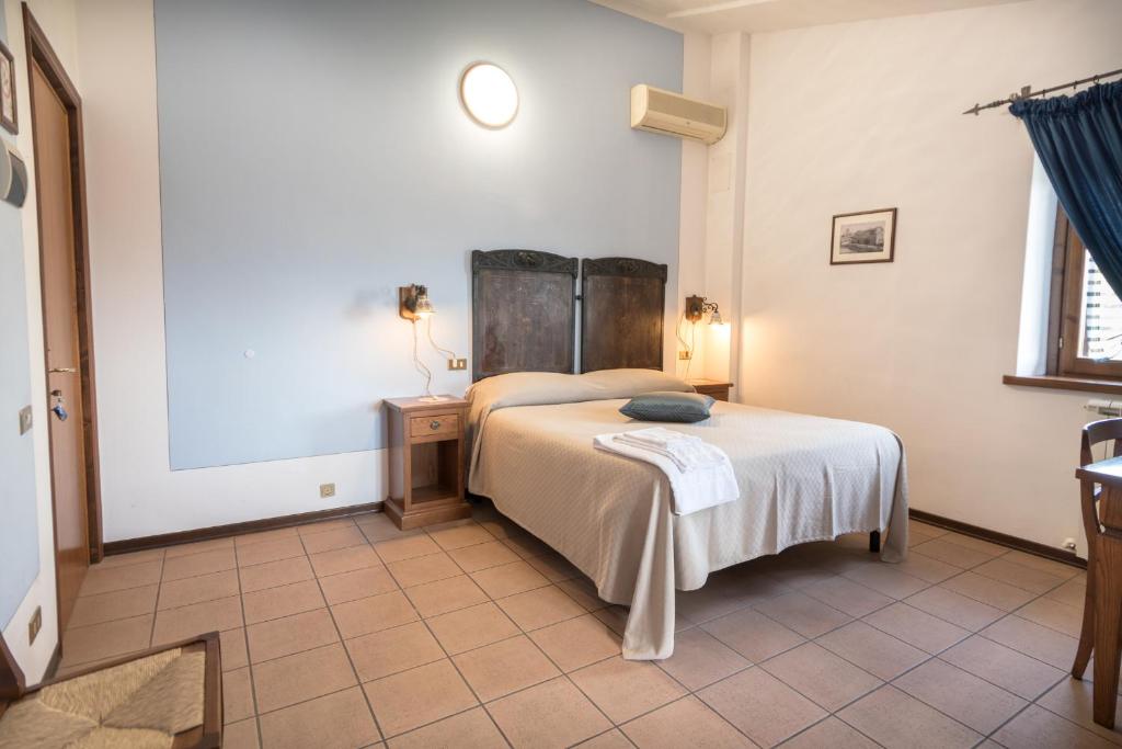 Postel nebo postele na pokoji v ubytování La Piaggia