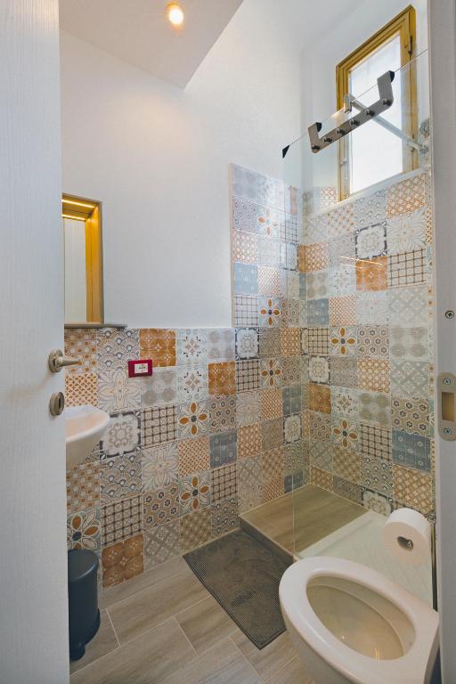 Koupelna v ubytování Luigino B&B