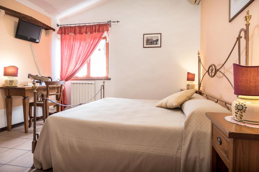 Postel nebo postele na pokoji v ubytování La Piaggia