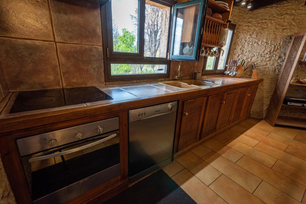 Kuchyň nebo kuchyňský kout v ubytování Roque nublo rural houses I
