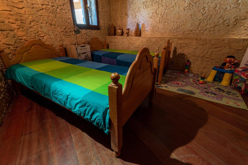 Postel nebo postele na pokoji v ubytování Roque nublo rural houses I