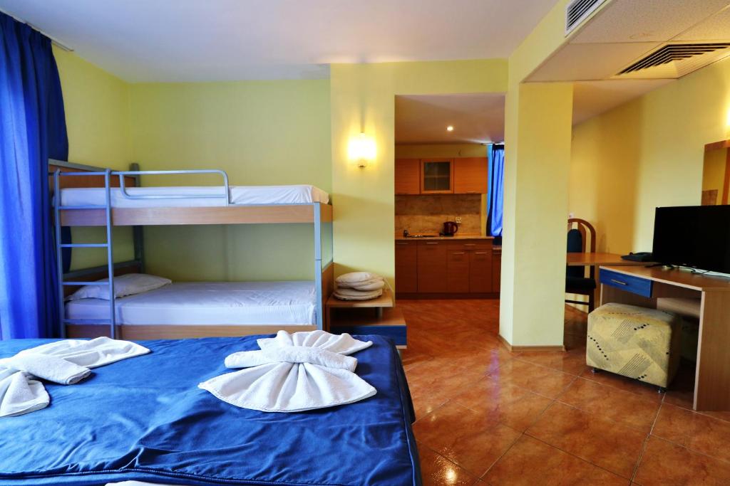 Postel nebo postele na pokoji v ubytování Bora Bora Hotel