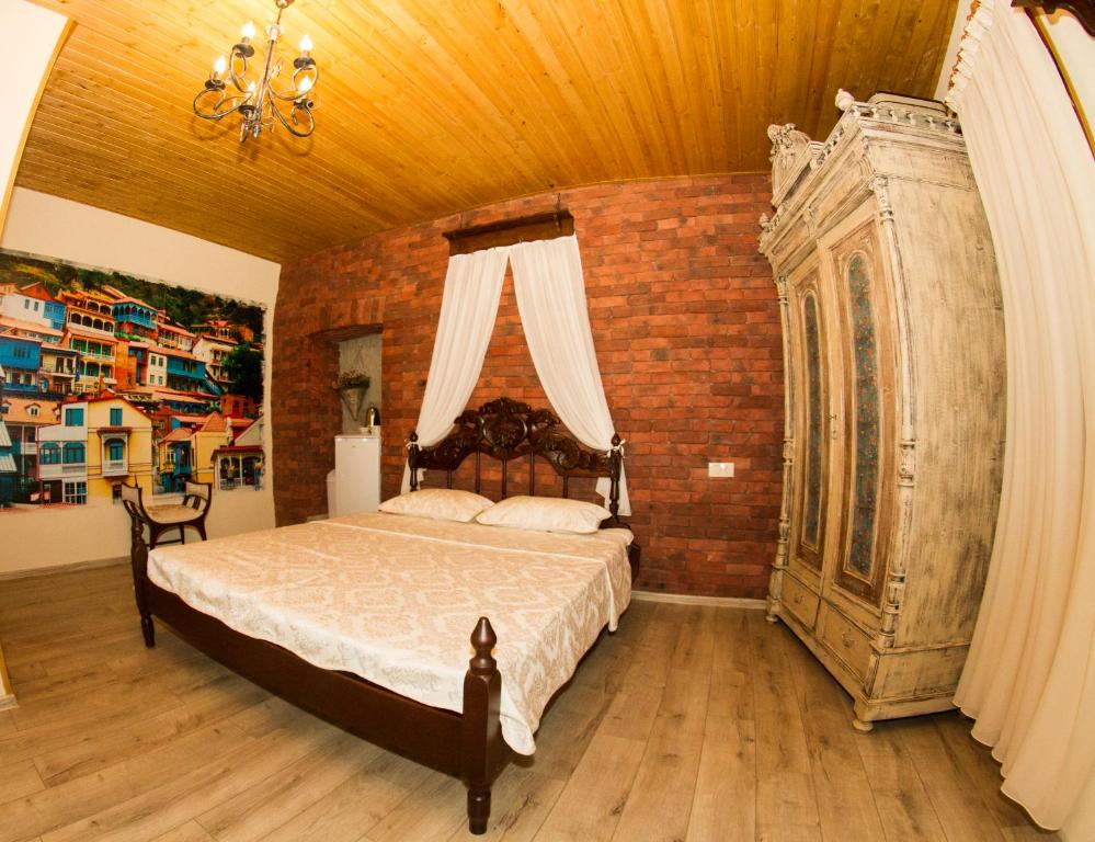 Postel nebo postele na pokoji v ubytování Vintage Art Rooms