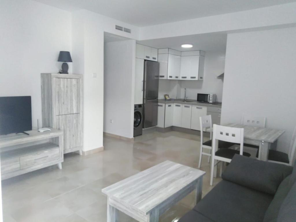 Kuchyň nebo kuchyňský kout v ubytování Apartamentos Cachón