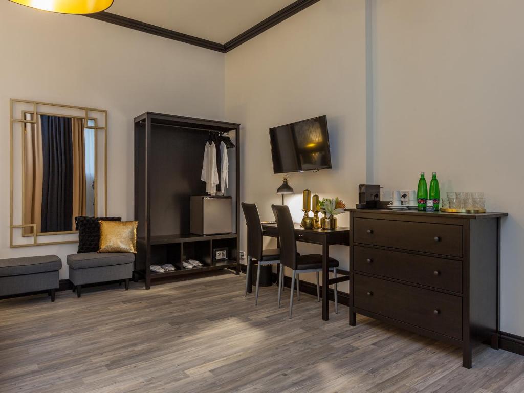 TV a/nebo společenská místnost v ubytování Golden Prague Rooms