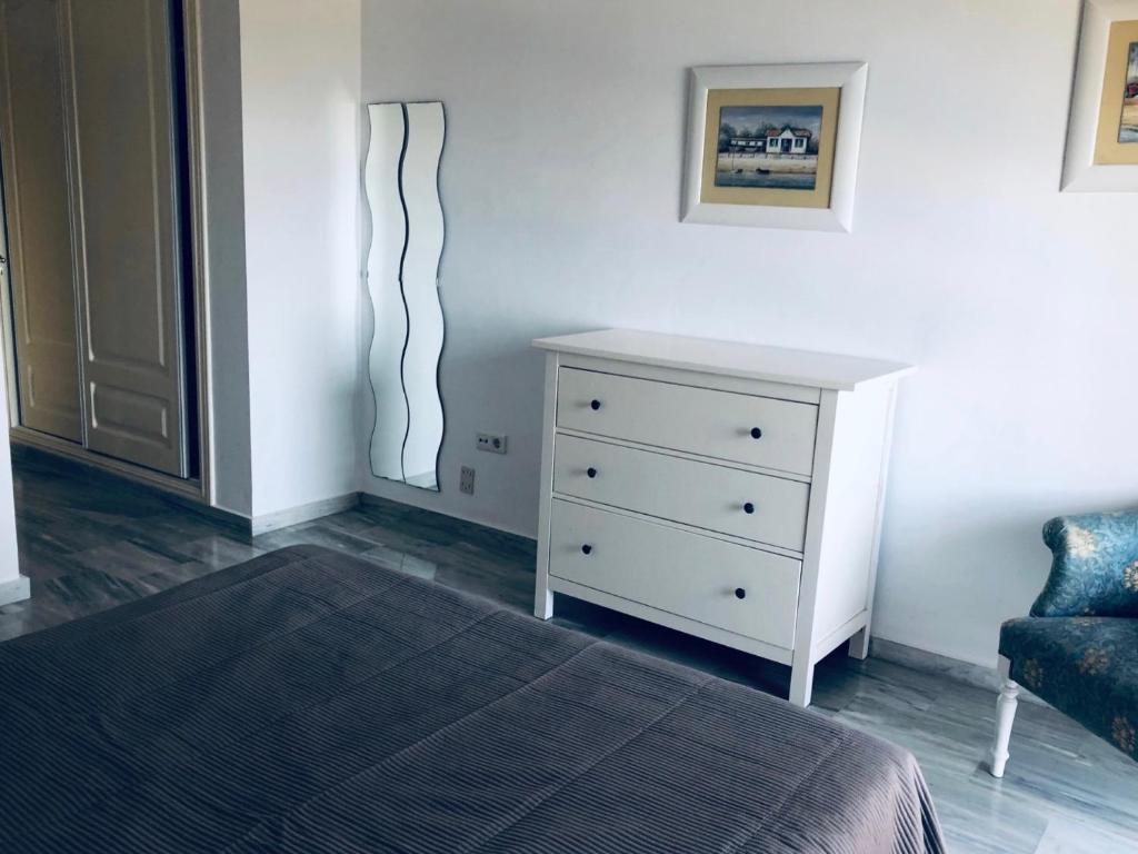 Łóżko lub łóżka w pokoju w obiekcie Casa de Dolores
