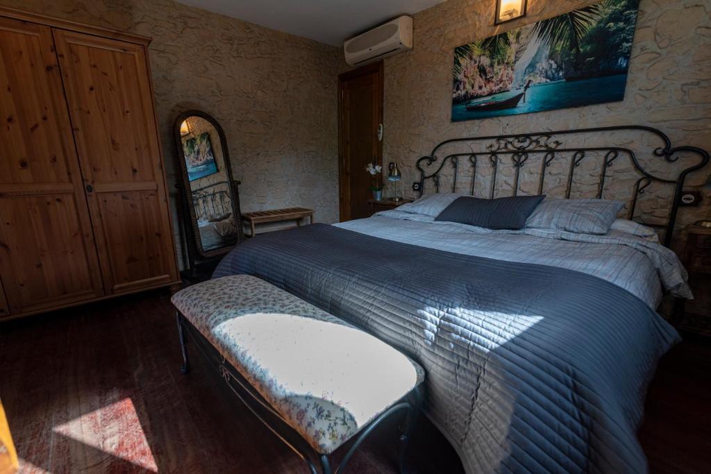 Postel nebo postele na pokoji v ubytování Roque nublo rural houses I