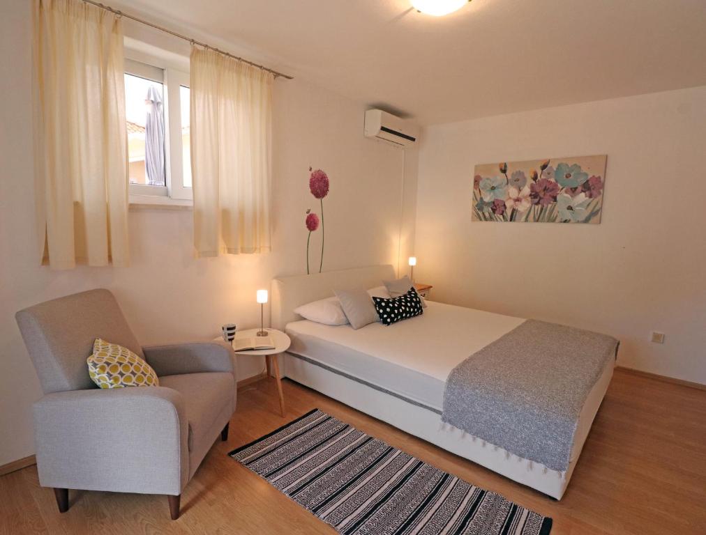 Postel nebo postele na pokoji v ubytování Guesthouse Korkyra Sun