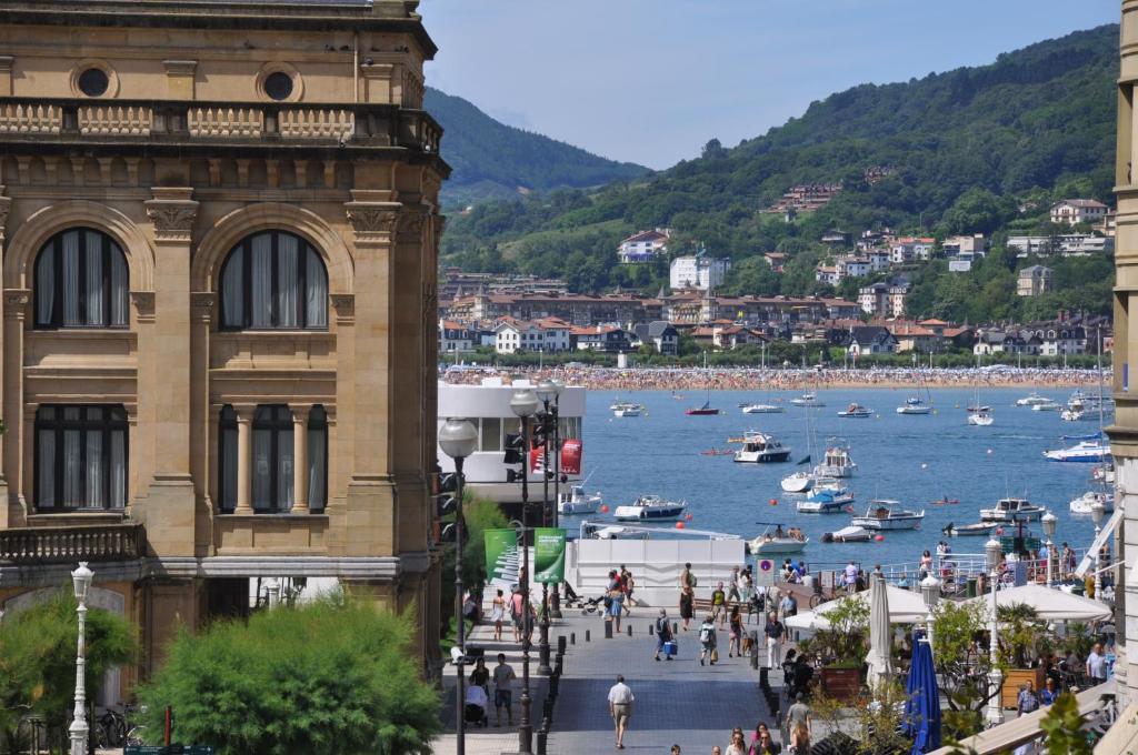 a group of boats in a body of water at Pension Alameda in San Sebastián