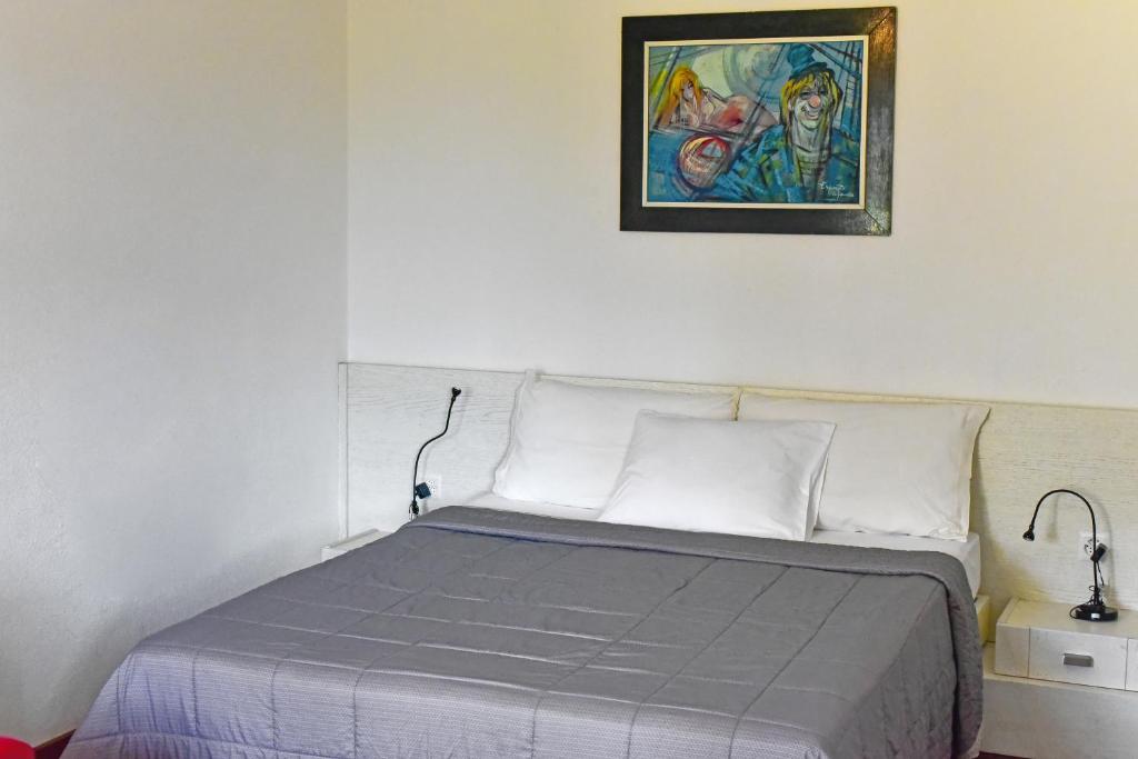 Postel nebo postele na pokoji v ubytování Viva Bacco