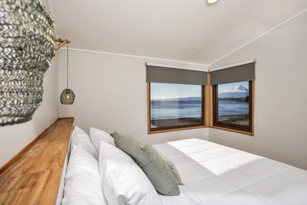 Letto o letti in una camera di Cala Melí