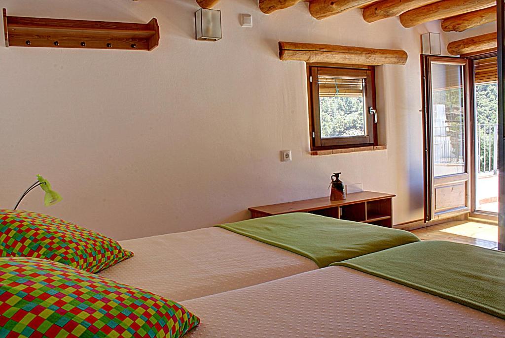 Postel nebo postele na pokoji v ubytování Posada del Candil