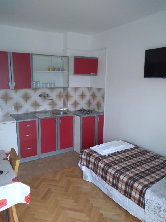 Posteľ alebo postele v izbe v ubytovaní Apartmants Emy