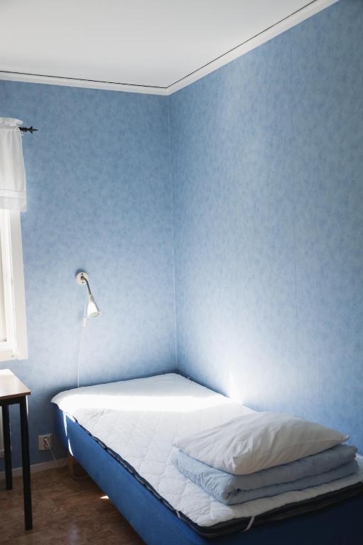 Postel nebo postele na pokoji v ubytování Visingsö Vandrarhem