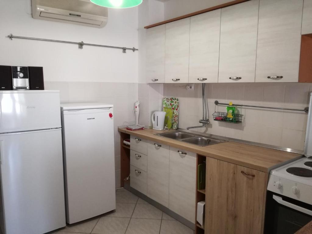 Kuchnia lub aneks kuchenny w obiekcie Apartments Domi