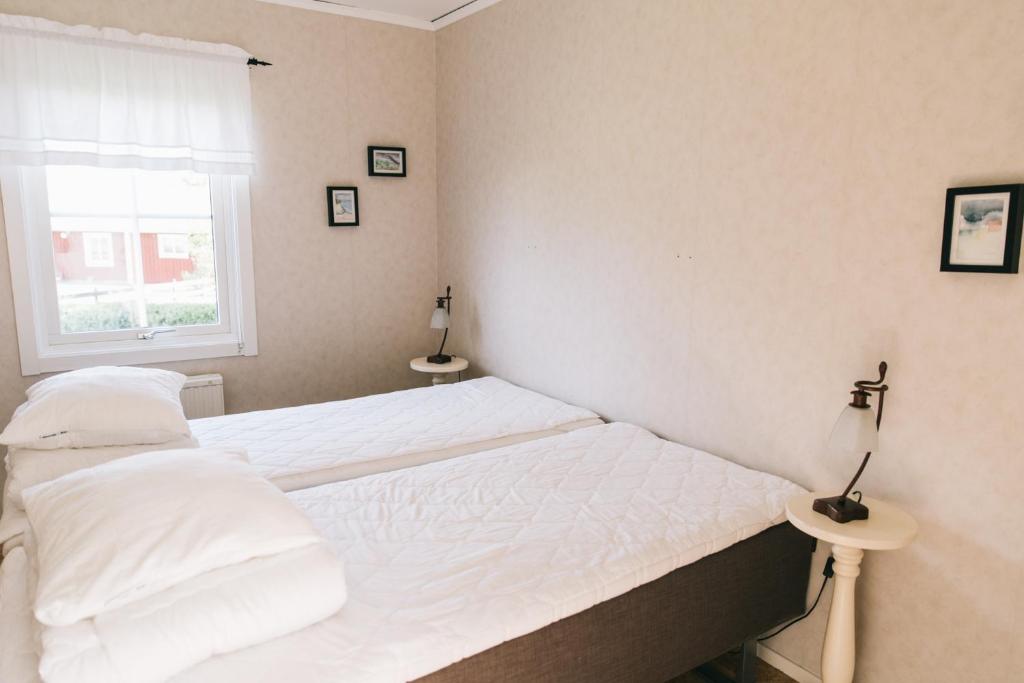 Postel nebo postele na pokoji v ubytování Visingsö Vandrarhem