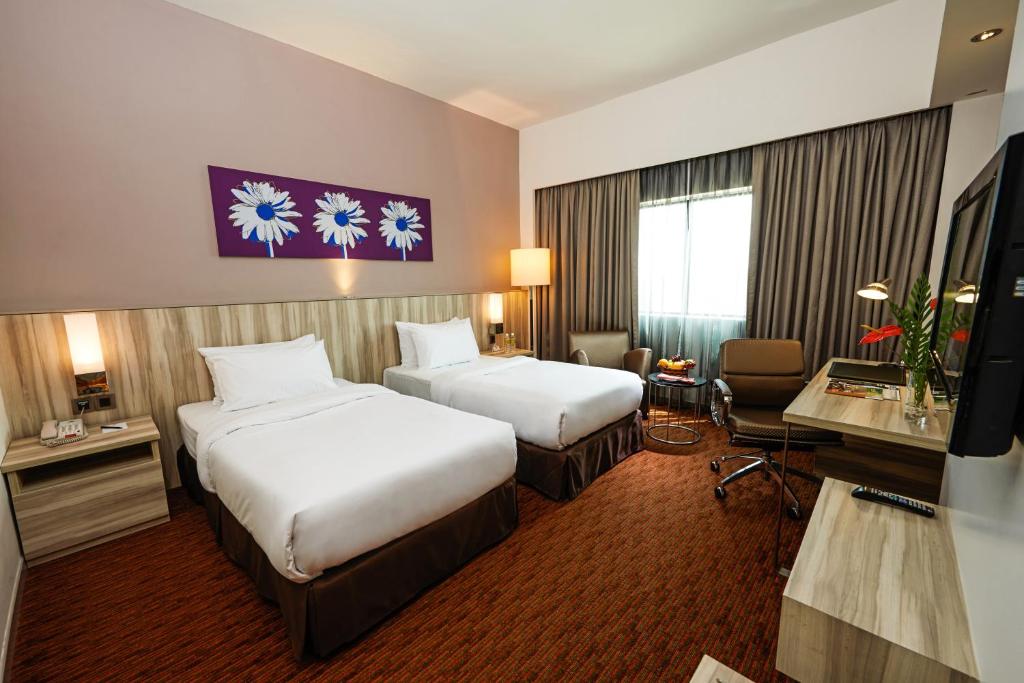 TV a/nebo společenská místnost v ubytování Sunway Hotel Seberang Jaya