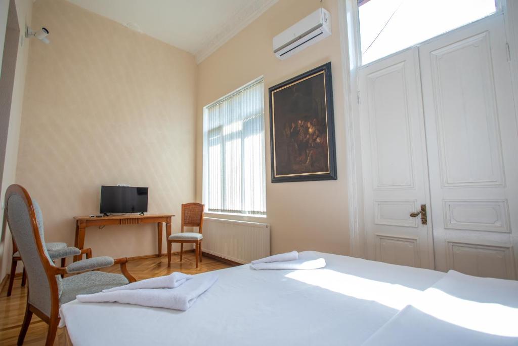 TV a/nebo společenská místnost v ubytování HOTEL VENETO