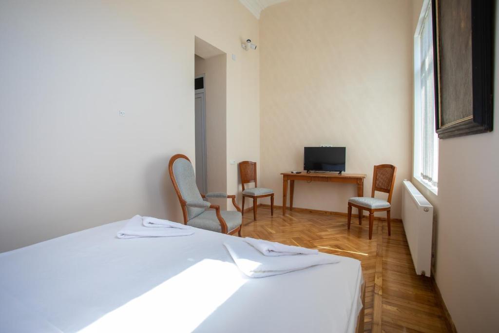 TV a/nebo společenská místnost v ubytování HOTEL VENETO