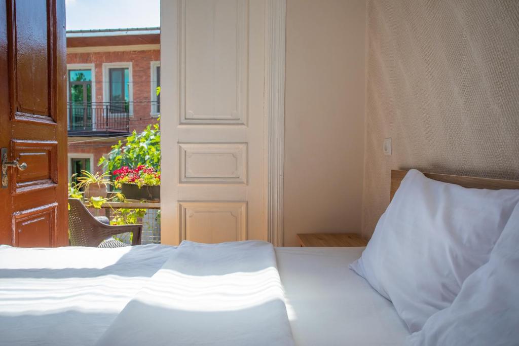 Postel nebo postele na pokoji v ubytování HOTEL VENETO