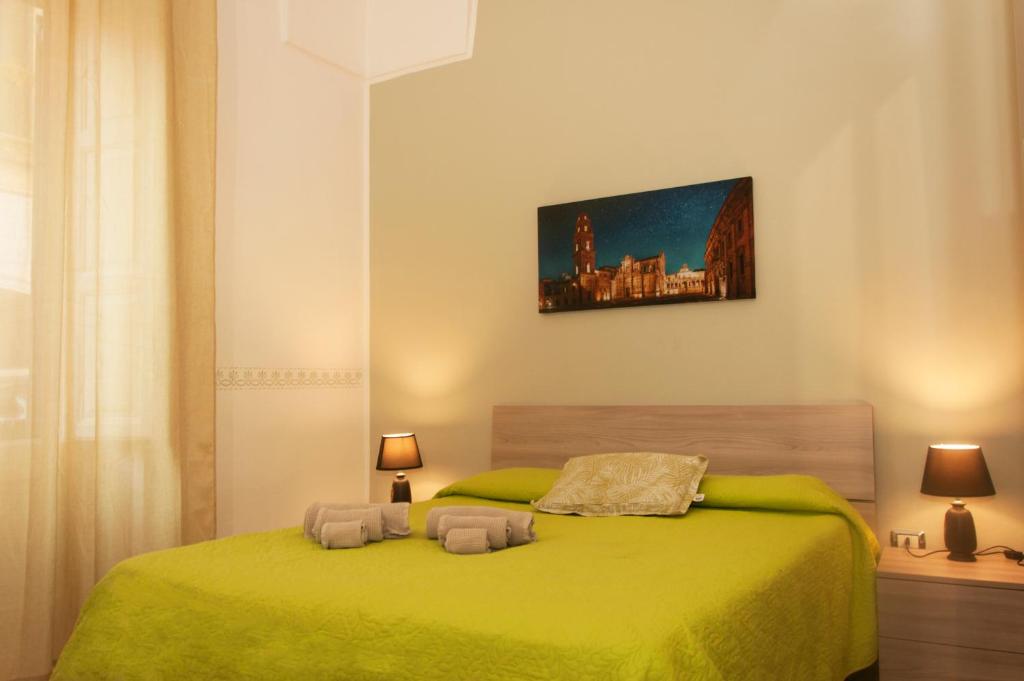 Postel nebo postele na pokoji v ubytování Wish Rooms Lecce