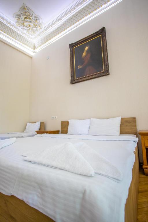 Postel nebo postele na pokoji v ubytování HOTEL VENETO