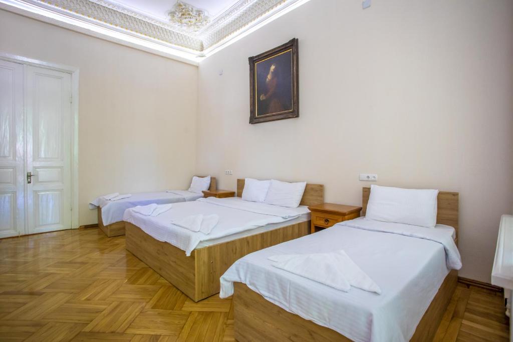 Postel nebo postele na pokoji v ubytování HOTEL VENETO