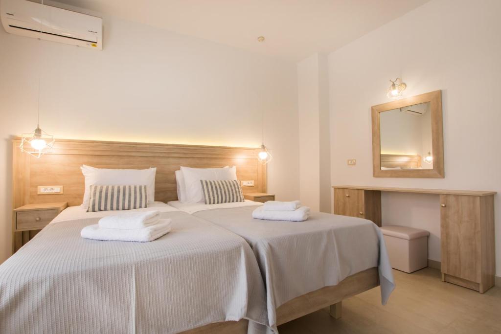 Posteľ alebo postele v izbe v ubytovaní Porfyris Studios and Apartments