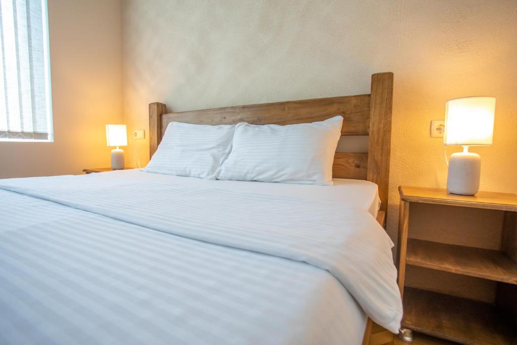 Postel nebo postele na pokoji v ubytování HOTEL VENETO