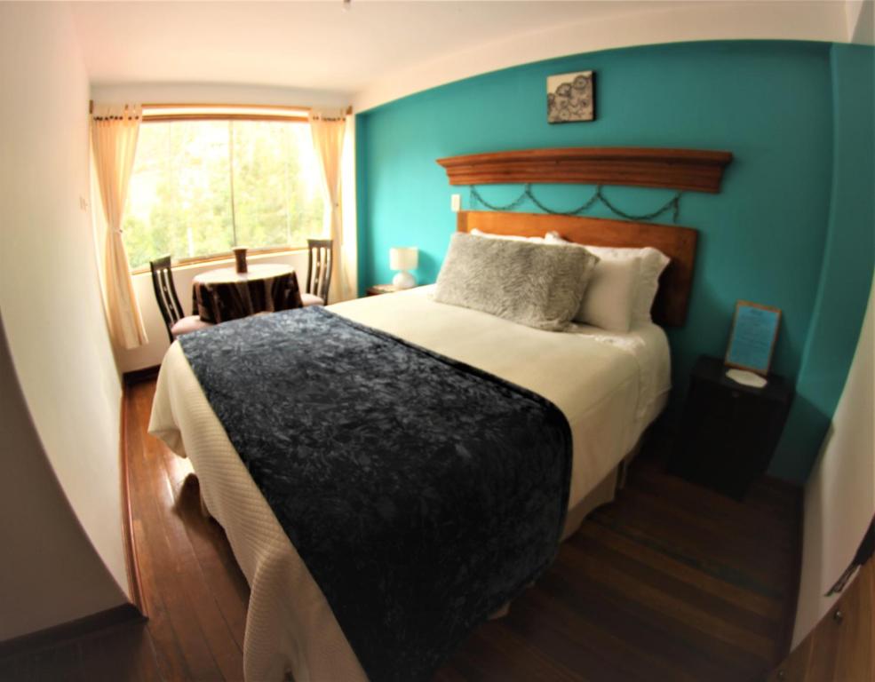 Postel nebo postele na pokoji v ubytování Parwa Guest House