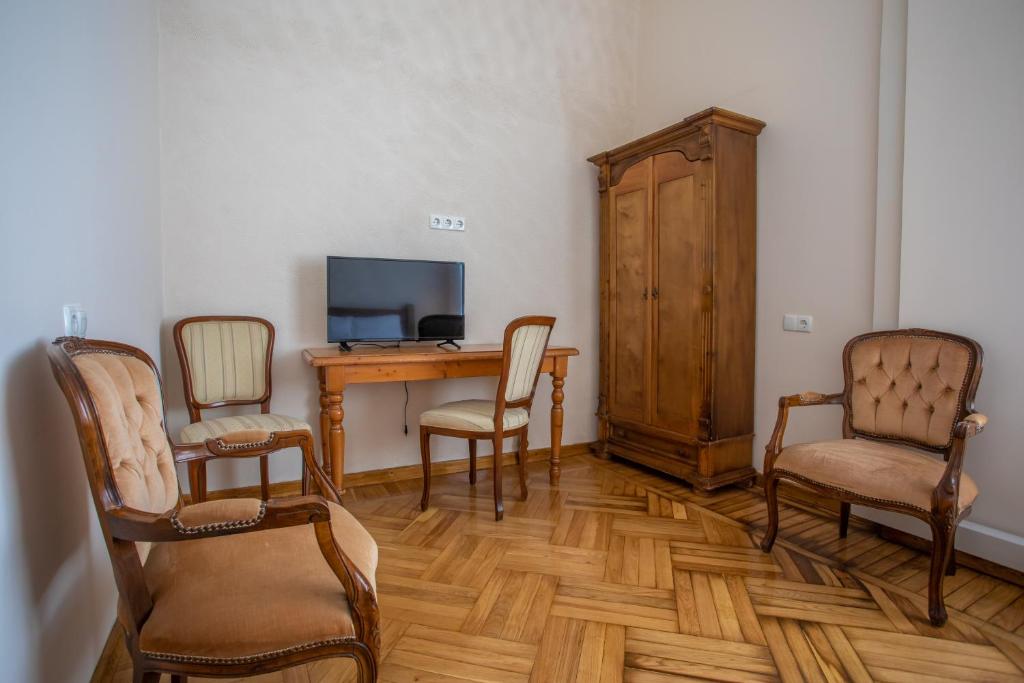TV a/nebo společenská místnost v ubytování HOTEL VENETO