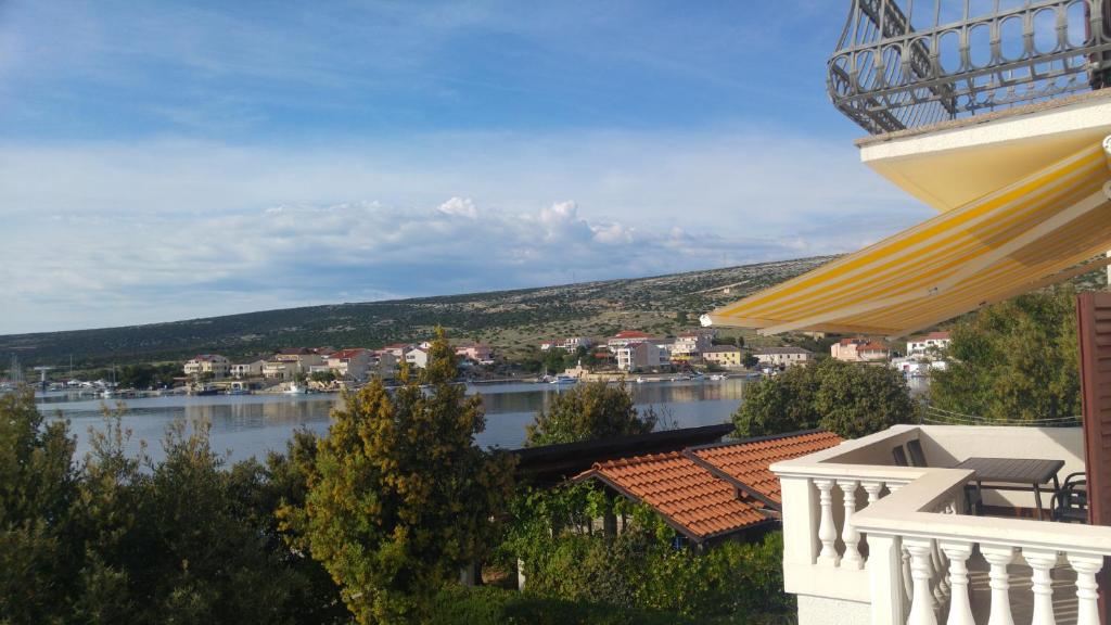 a view of a river from a balcony of a building at Apartments Simuni 66 in Šimuni