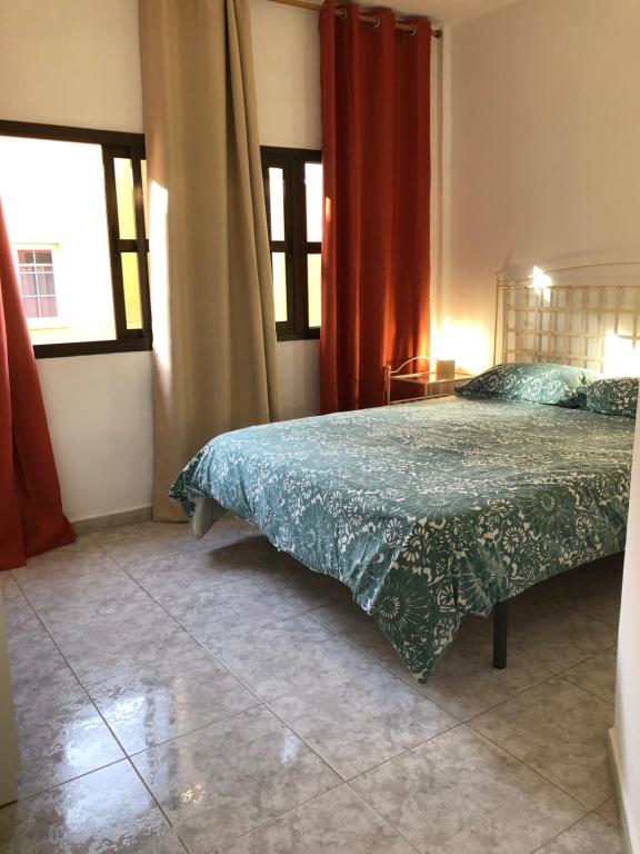 Postel nebo postele na pokoji v ubytování APARTAMENTO GUAJARA