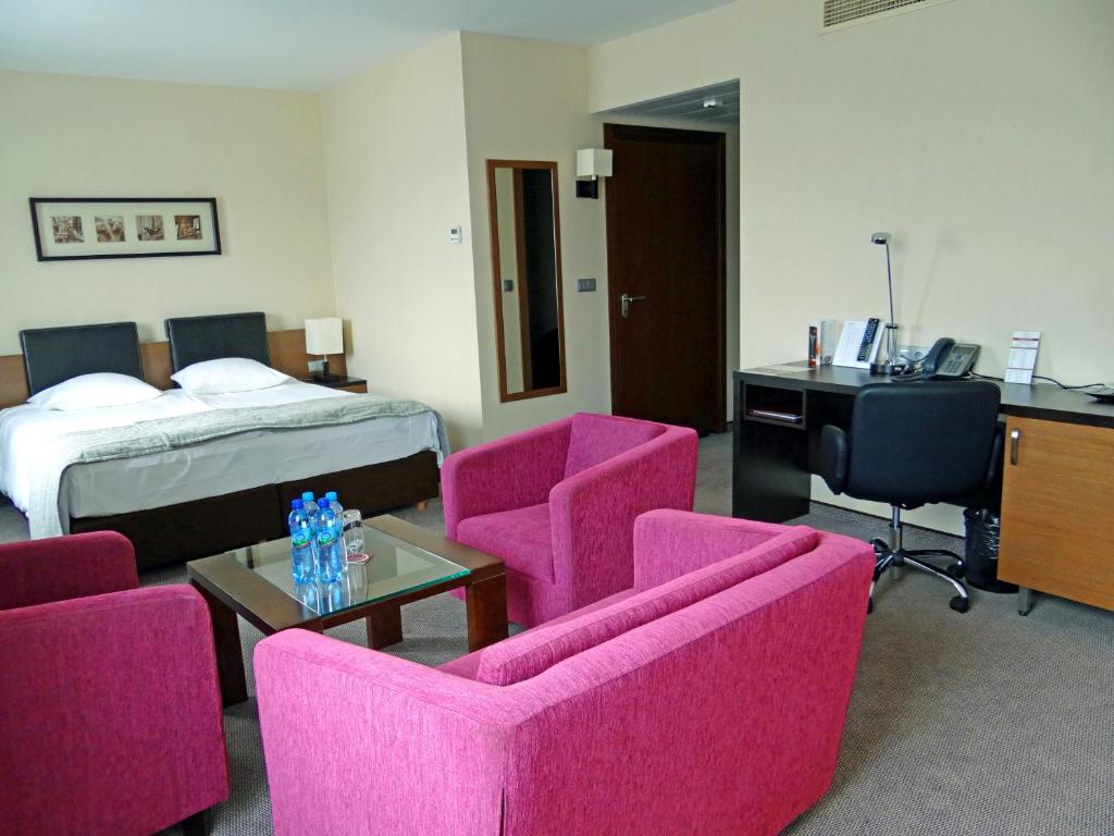 Postel nebo postele na pokoji v ubytování Qubus Hotel Bielsko-Biała