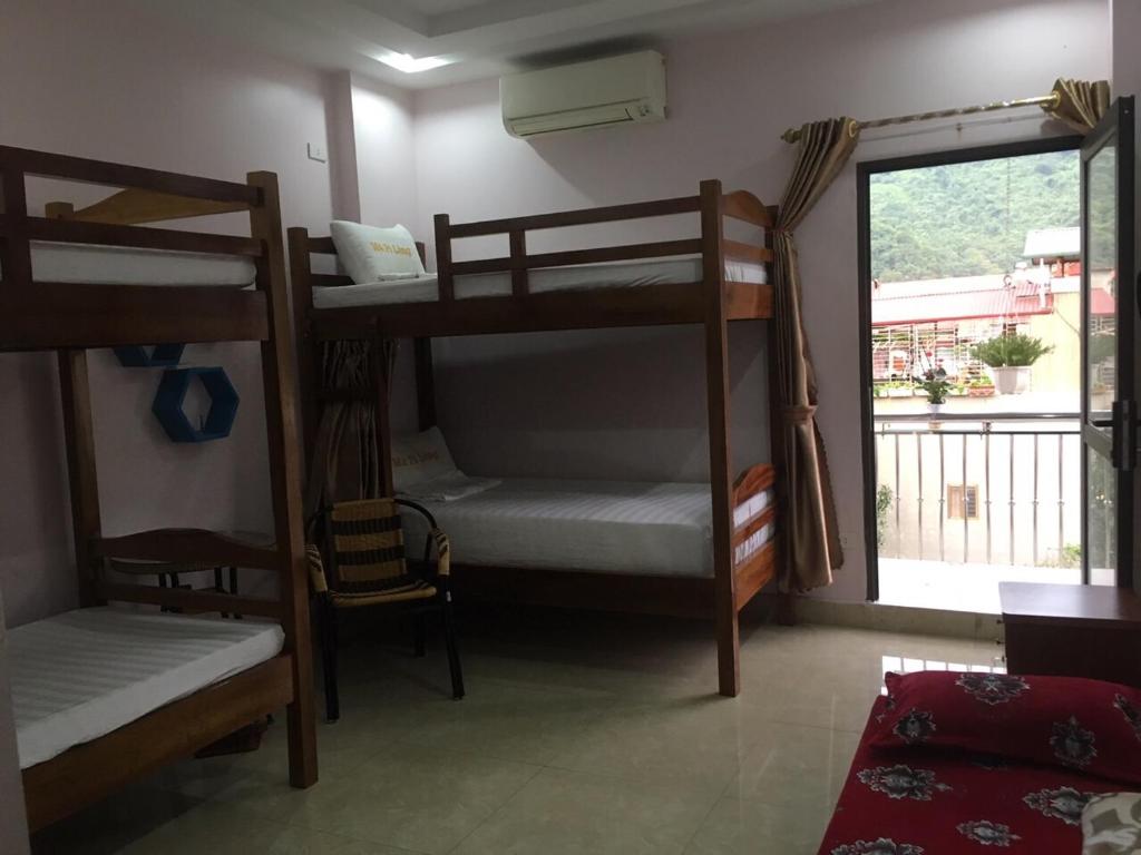 Postel nebo postele na pokoji v ubytování Ruby Hostel Hà Giang