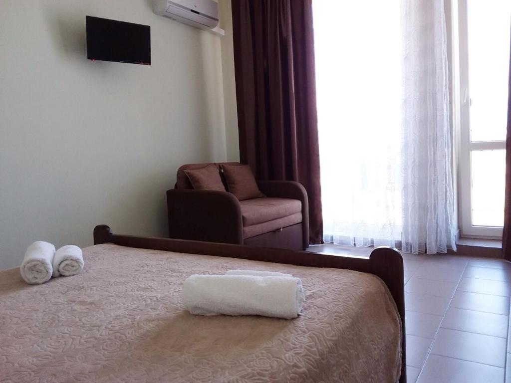 Postel nebo postele na pokoji v ubytování Hotel Golden Beach