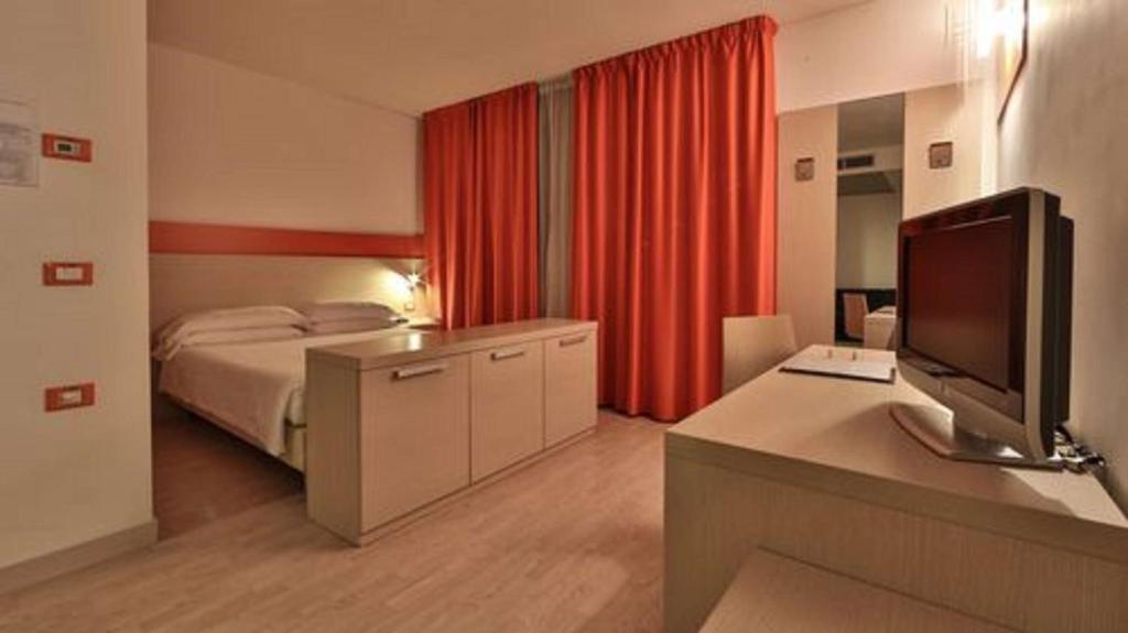 Postel nebo postele na pokoji v ubytování Best Western Plus Hotel Galileo Padova