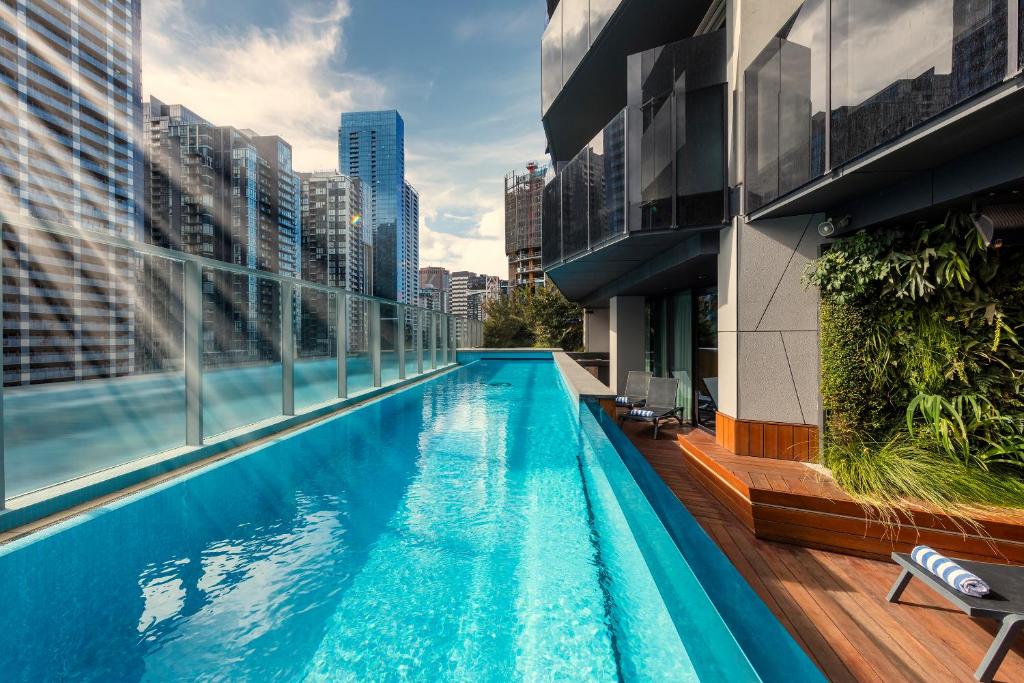 a large swimming pool in a large building at Imagine Marco in Melbourne
