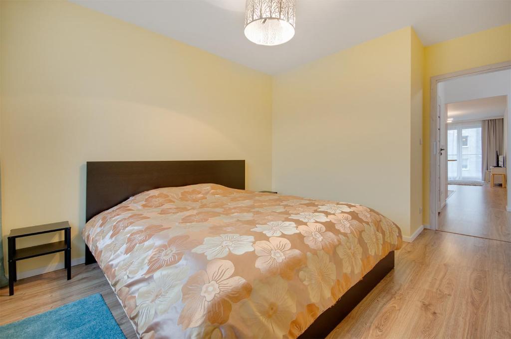 Postel nebo postele na pokoji v ubytování Apartment Kordiana