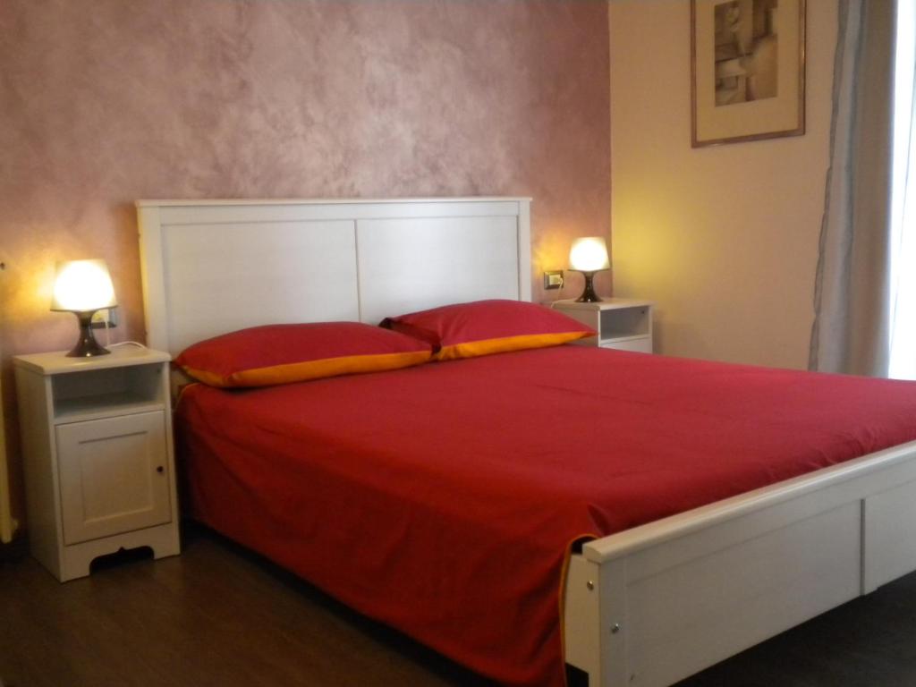 Łóżko lub łóżka w pokoju w obiekcie Trionfale Rooms