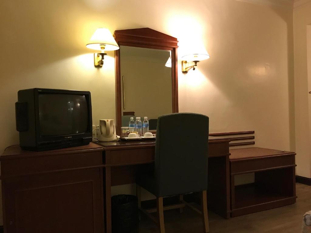 TV a/nebo společenská místnost v ubytování The Executive Hotel Lahad Datu
