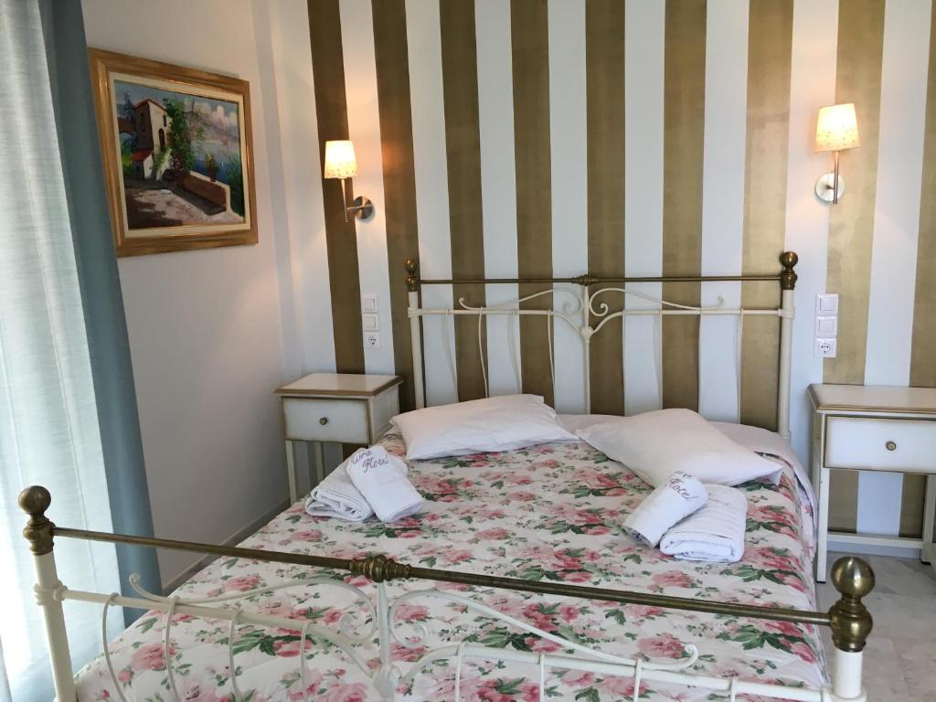 Postel nebo postele na pokoji v ubytování Hotel Avra