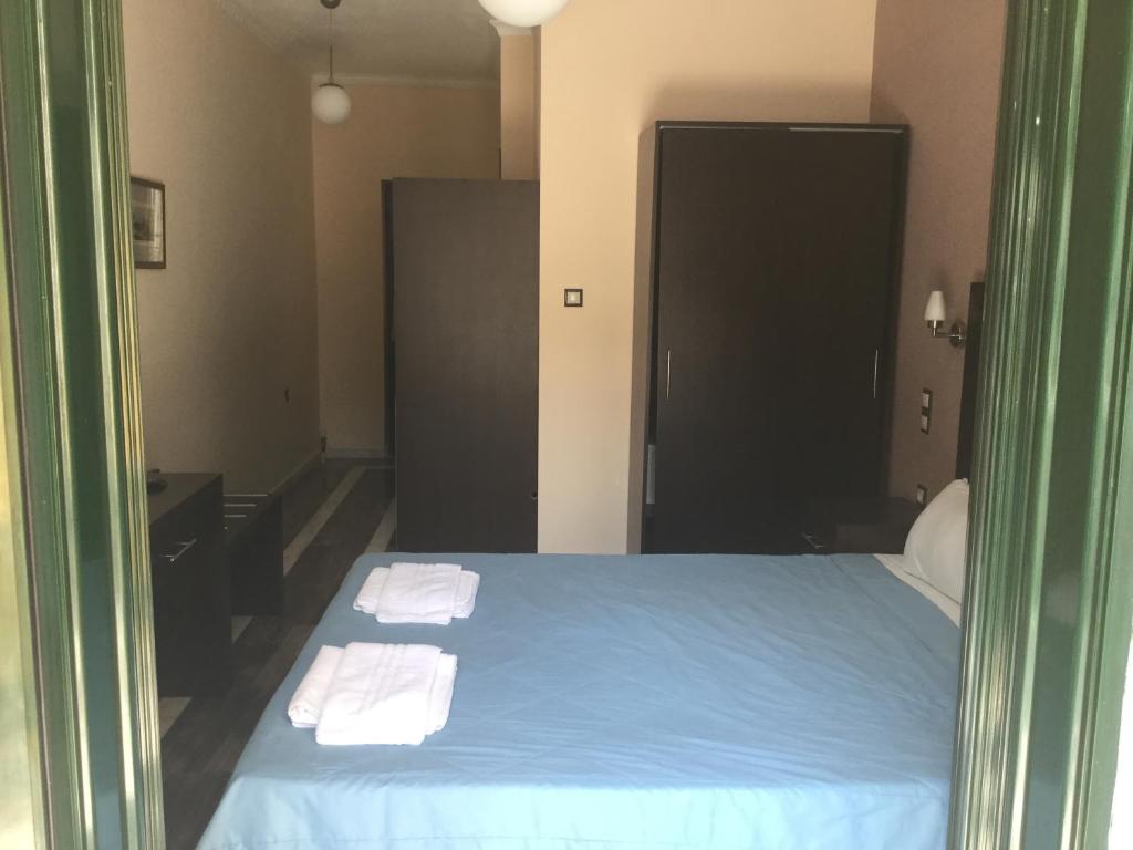 A bed or beds in a room at Villa Vasso
