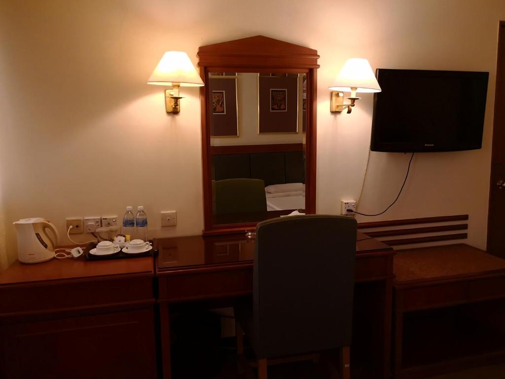 TV a/nebo společenská místnost v ubytování The Executive Hotel Lahad Datu