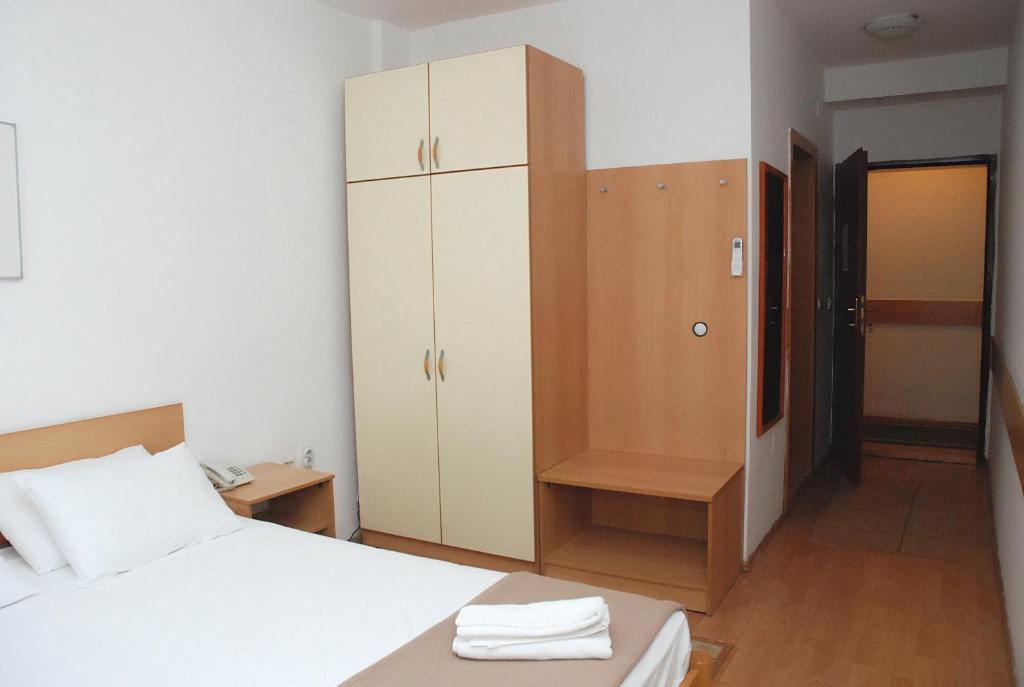 Postel nebo postele na pokoji v ubytování Hotel 7