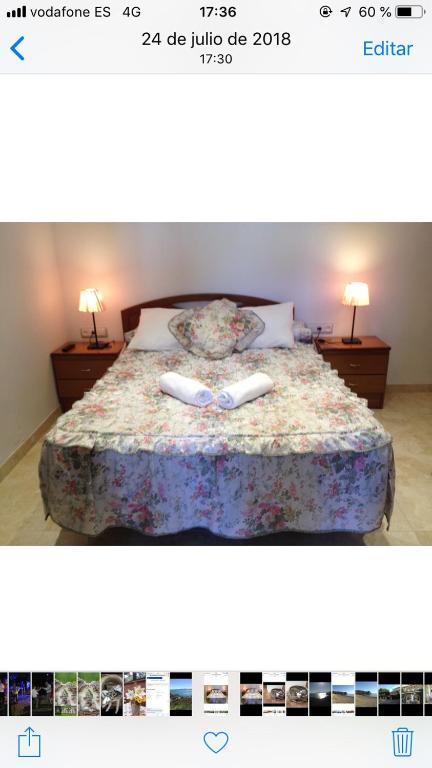 Postel nebo postele na pokoji v ubytování Hotel Comodoro